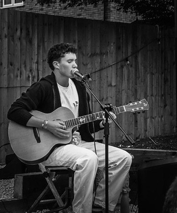 Ben playing a solo acoustic set