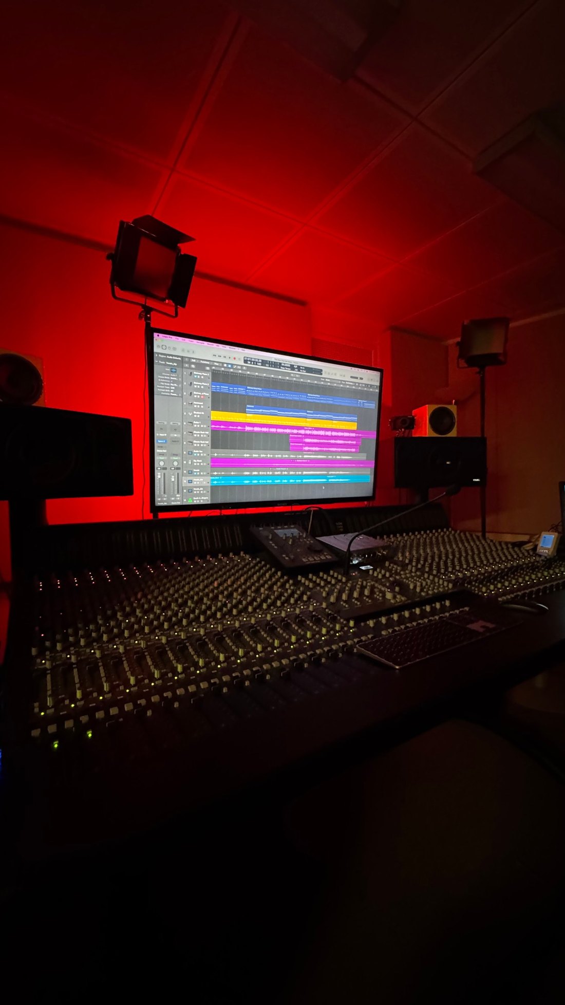Recording studio with a large mixing console